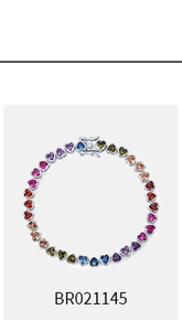 Close-up of heart-shaped multi-color cubic zirconia gemstones on a silver link bracelet