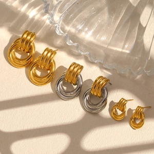 Three pairs of interlocking 316L stainless steel gold and silver hoops in multiple sizes