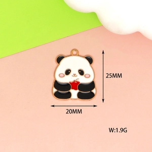 Detail of panda enamel charm with dimensions 25mm x 20mm and weight 1.9g shown on background