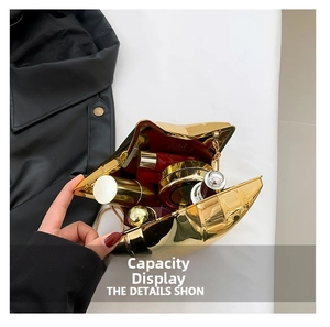 Internal view of gold star-shaped clutch bag showing capacity for cosmetics and lipsticks