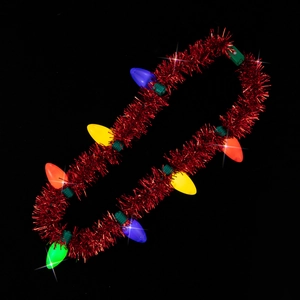 Detail of Christmas tinsel necklace with glowing colorful LED bulbs for party props