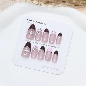 Handgefertigte rosa und braune French Cat-Eye-Nägel zum Aufdrücken mit Sternen