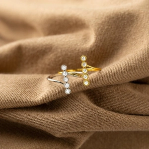 Minimalist S925 silver ring featuring five vertical round zircons on slim open band