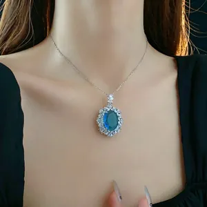 Luxurious oval blue gemstone flower pendant necklace in a refined French palace style