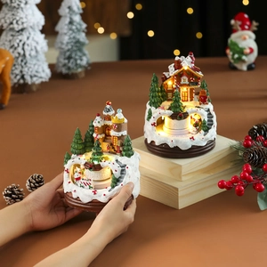 Christmas resin gingerbread castle and cottage rotating music box with warm LED lights