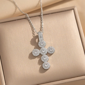 Silver-colored cross necklace with micro-pave white stones in a luxury gift box