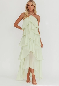 Detail of multi-layered ruffle chiffon dress with halter neck and asymmetrical hemline
