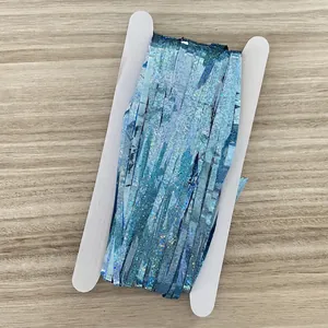 Blue laser tinsel fringe curtain on white card for birthday party backdrop decoration