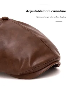 Detail of wide foldable brim and premium leather texture on vintage brown flat cap