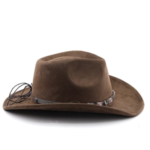 Detail of dark brown suede cowboy hat with woven band and classic curved brim