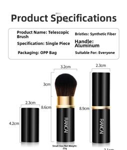 Detail of portable retractable makeup brush with synthetic bristles and aluminum handle
