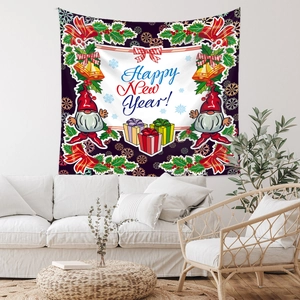 Detail of Happy New Year tapestry featuring festive gnomes and gold bells on fabric