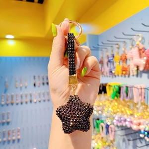 Portachiavi a stella nera scintillante con anello dorato per borse e accessori moda