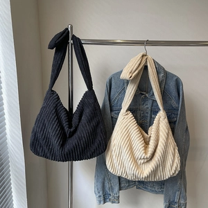 Large corduroy tote bag for women in black and beige with stylish knot shoulder straps