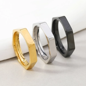 Minimalist 4mm hexagonal stainless steel rings in gold, silver, and black finishes