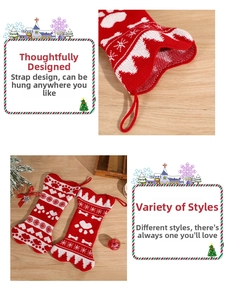 Detail of red and white knitted pet Christmas stockings with bone patterns and hanging loops