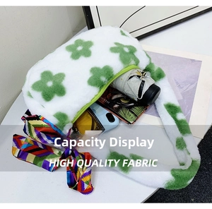 Detail showing plush tote bag capacity with phone, umbrella and wallet inside