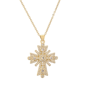 Goldene Kreuzkette mit Mikro-Zirkon-Besatz und filigraner Kette auf weißem Grund