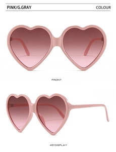 Front and 45-degree views of heart-shaped pink sunglasses with gradient gray lenses