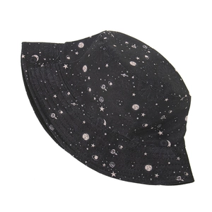Detailed close-up of the black bucket hat showing mystical star and planet prints