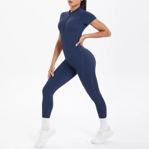 Detail view of navy blue high-stretch yoga jumpsuit with front zipper and short sleeves