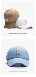 Detail view of cotton baseball caps showing 3D embroidered R letter and quality stitching