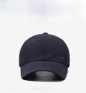 Front view of a navy blue breathable baseball cap featuring the narason logo