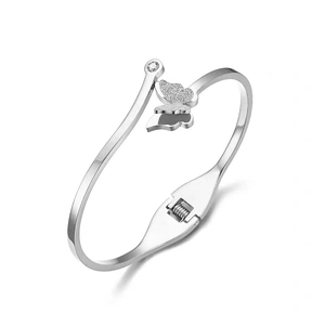 Detail of silver butterfly open bangle featuring sparkling textures and cubic zirconia