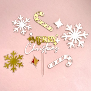 Acrylic Christmas cake topper set with snowflakes and candy canes for holiday party decor.