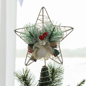 Glittering gold star Christmas tree topper with pine needles and plaid bow decoration