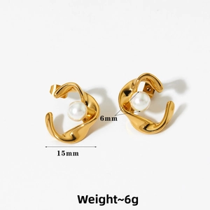 Detailed view of 15mm twisted gold pearl stud earrings with 6mm white pearl center