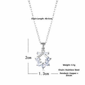 Detail of silver floral necklace with zircons and bow pendant on a 40+5cm chain