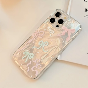 Detail view of pearlescent iPhone case with colorful ribbon bow patterns and a sleek IMD finish