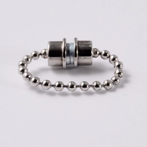 Detail of silver magnetic bead chain link with metallic finish on white background