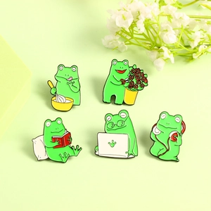 Set of five cute green enamel frog pins showing various hobbies and work activities