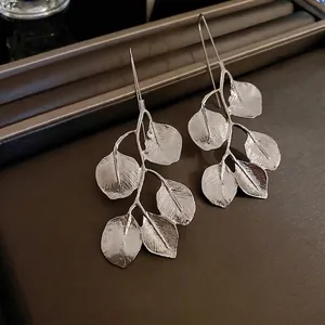 Exquisite silver leaf branch drop earrings with realistic leaf vein texture details