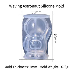 Detailed view of waving astronaut silicone mold showing size 55x70mm and 2mm thickness