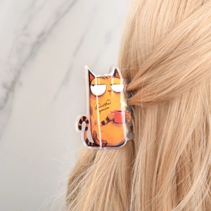 Cute orange cat hair claw clip with coffee cup design on blonde hair for daily hair styling