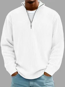 Detail of white men's polo with vertical corduroy texture and zip collar design