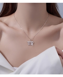 Detail of S925 silver Virgo zodiac pendant with pavé cubic zirconia on a necklace