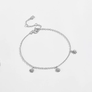 Detail view of S925 sterling silver daisy bracelet with three flower charms and lobster clasp