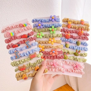 Set of colorful cartoon hair ties with bunny bear and flower patterns in checkered fabric