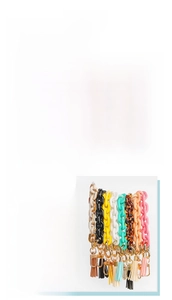 Close-up of colorful acrylic chain charms with metal lobster clasps and matching tassels