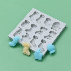 Christmas silicone mold with stocking and glove shapes for festive DIY baking and crafts
