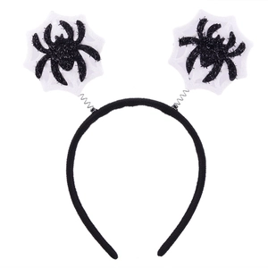 Detail of Halloween spider headband with glittery black spiders on white web springs