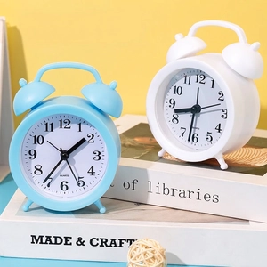 Minimalist macaron style twin bell silent alarm clock in sky blue and white finish