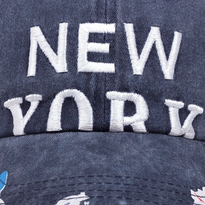Navy blue cotton baseball cap featuring 3D New York embroidery and printed brim details