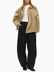 Short khaki double-breasted jacket paired with high-waist black trousers for women