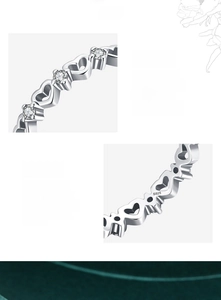 Detailed close-up of hollow heart s925 silver ring featuring micro-set 5A cubic zirconia