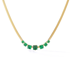 Detail of gold-plated herringbone chain necklace with seven green square zircons